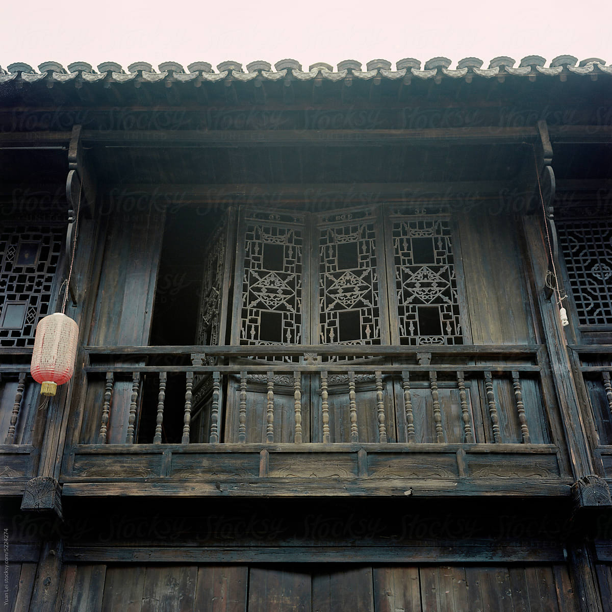 Screen doors on the second floor of ancient buildings