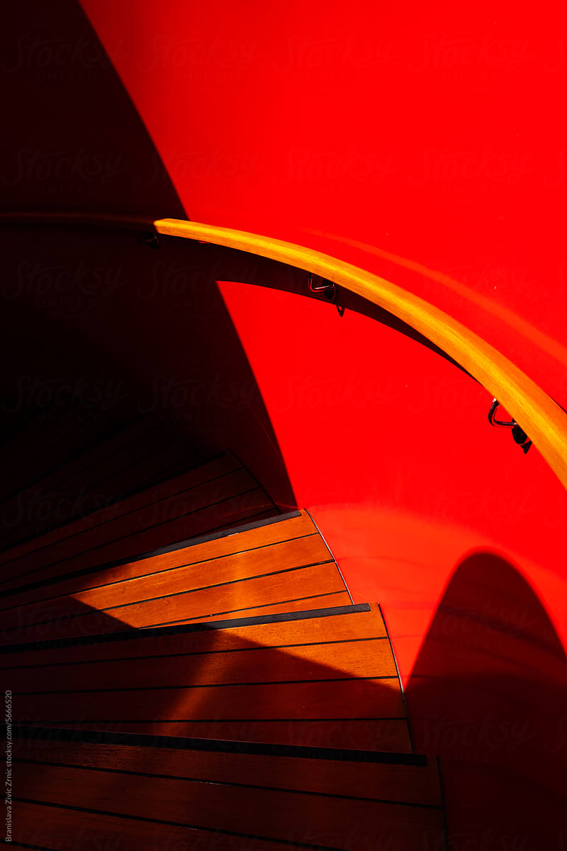 Glowing red stairwell on a cruise ship