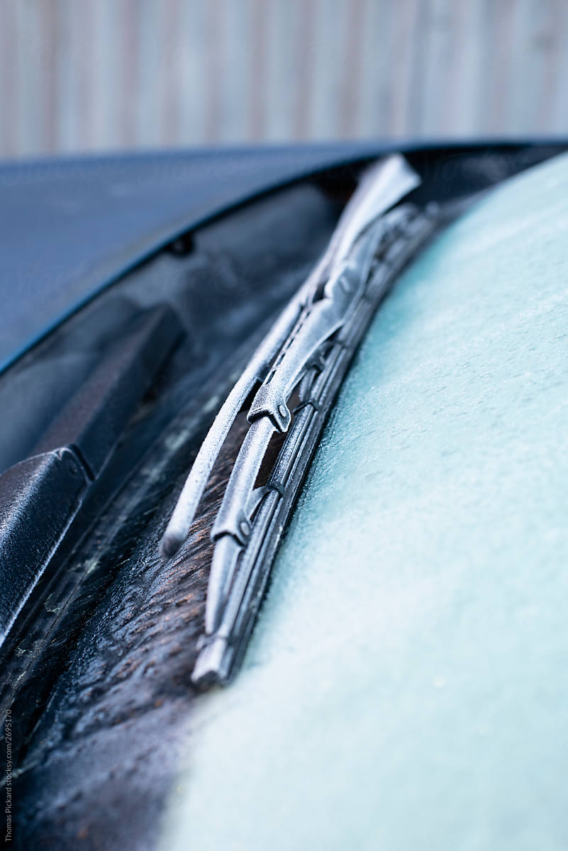 Frost on windscreen wipers in winter.