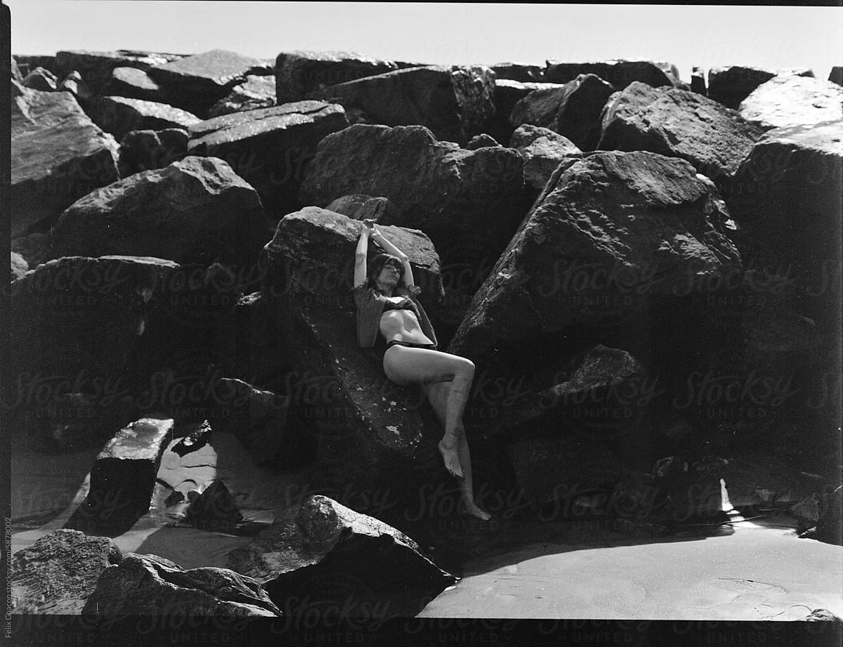 Analog Photo Of Woman On The Rocks