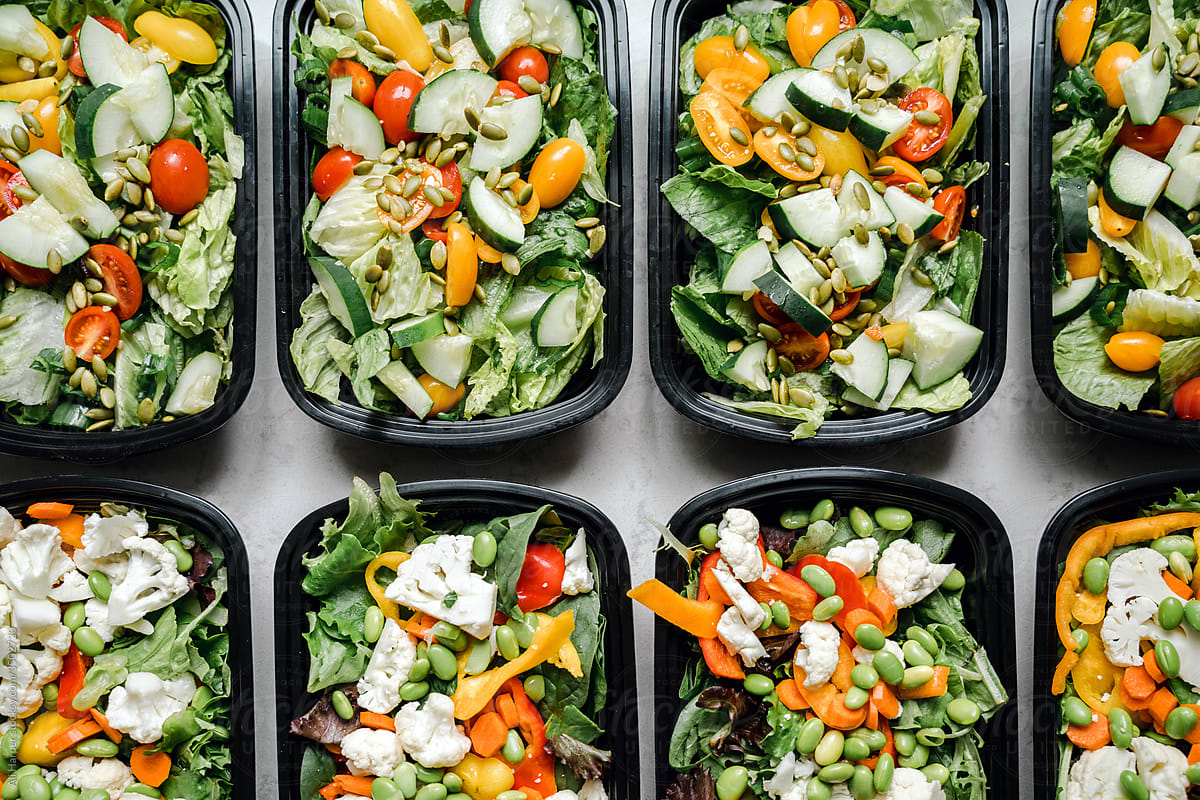 Salad containers prepped for healthy meal planning