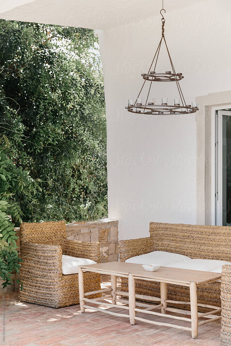Outdoor rattan couches at a Portuguese guesthouse.