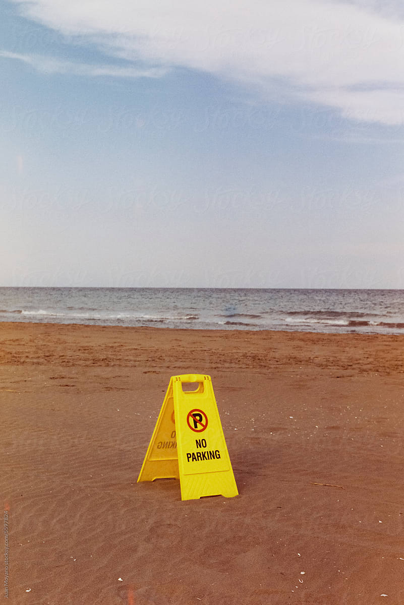yellow no parking sign on the beach, 35mm film