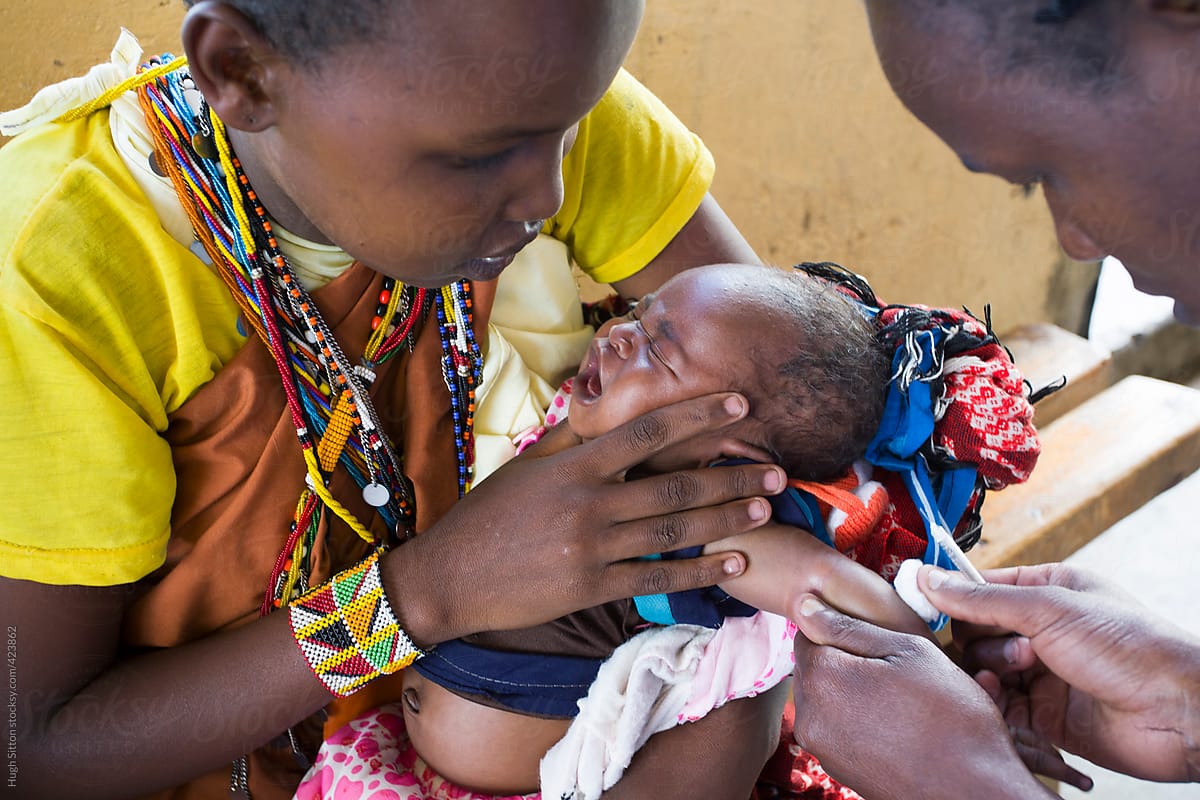 Baby receiving vaccine. Medial Clinic. Kenya. Africa.