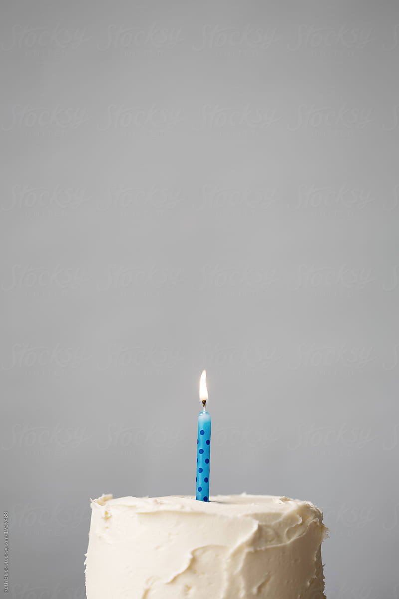 Birthday cake with blue candle