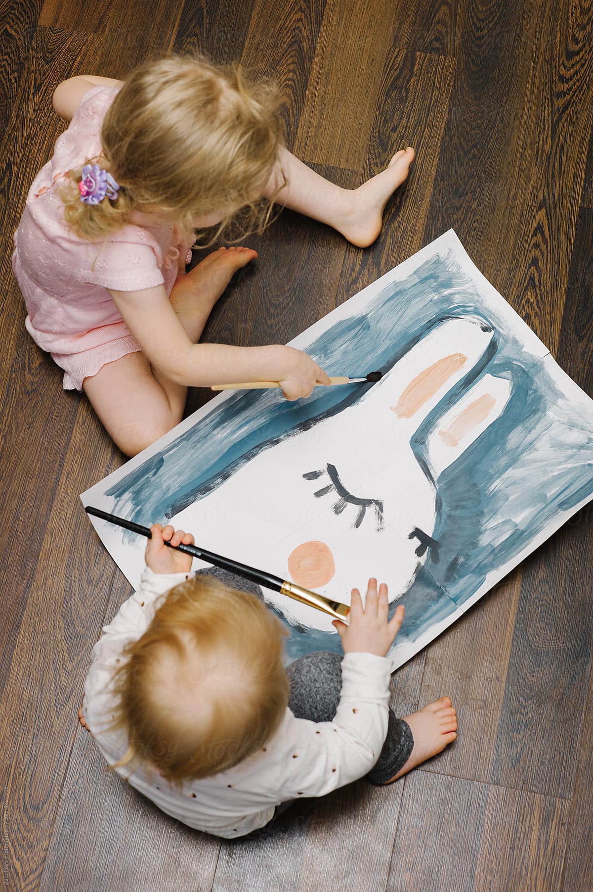 Children drawing a rabbit