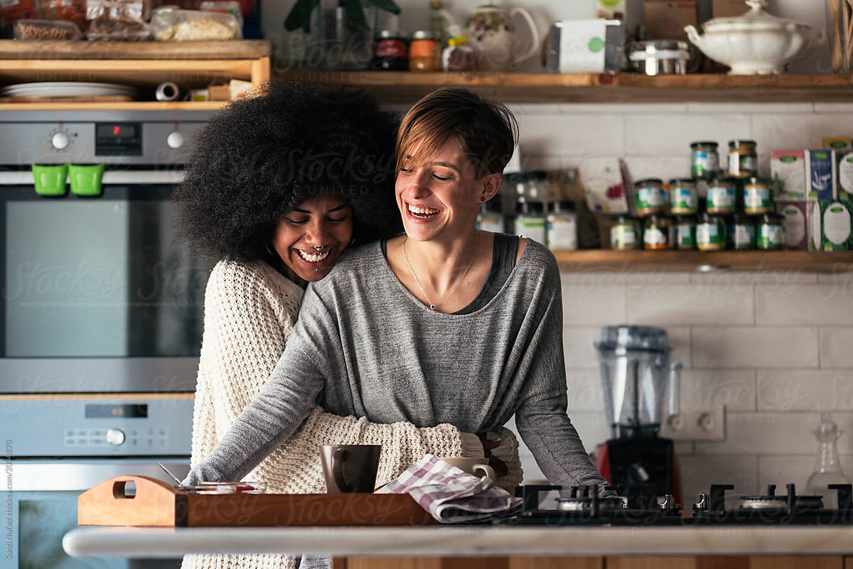 Two Beautiful Girls Having Fun While Have Breakfast In Them Home By Stocksy Contributor 