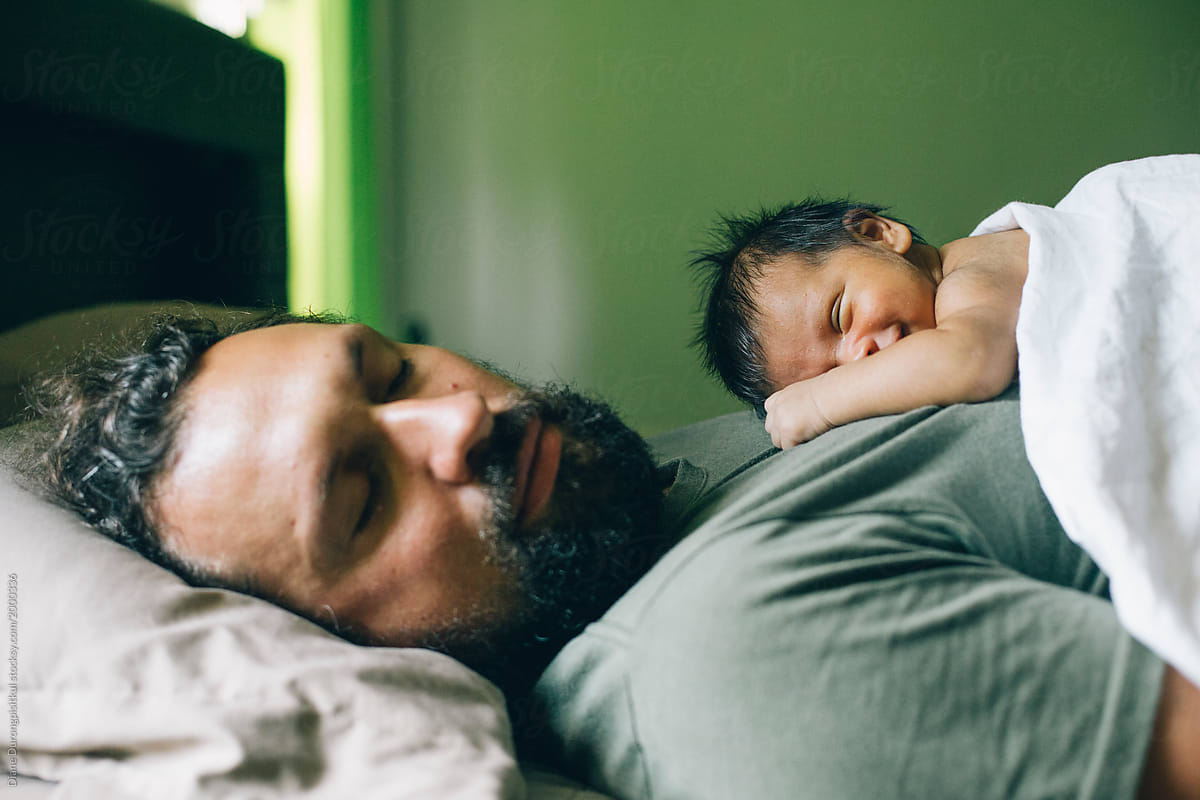 Baby and Father sleeping