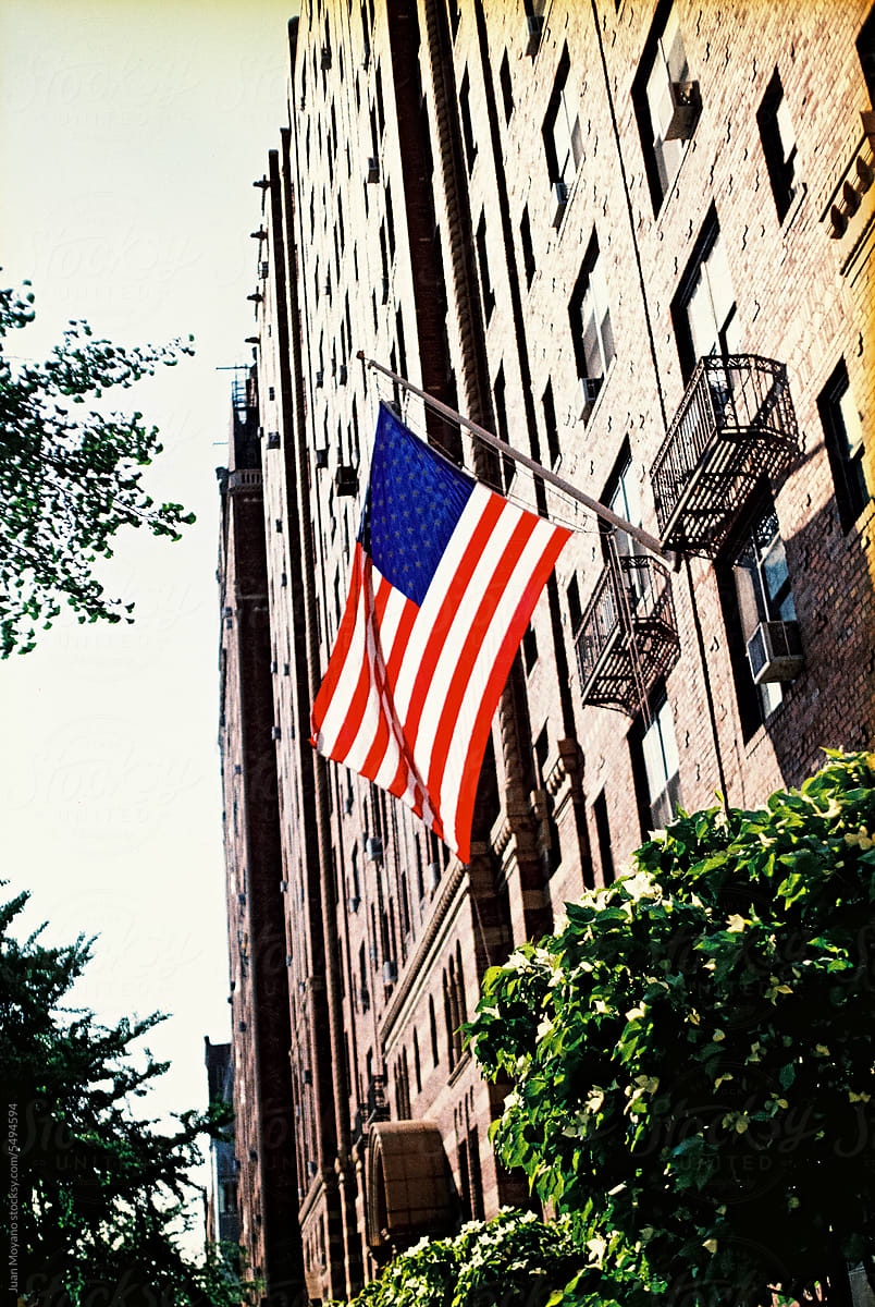 american flag in a brick building in NYC, 35 mm