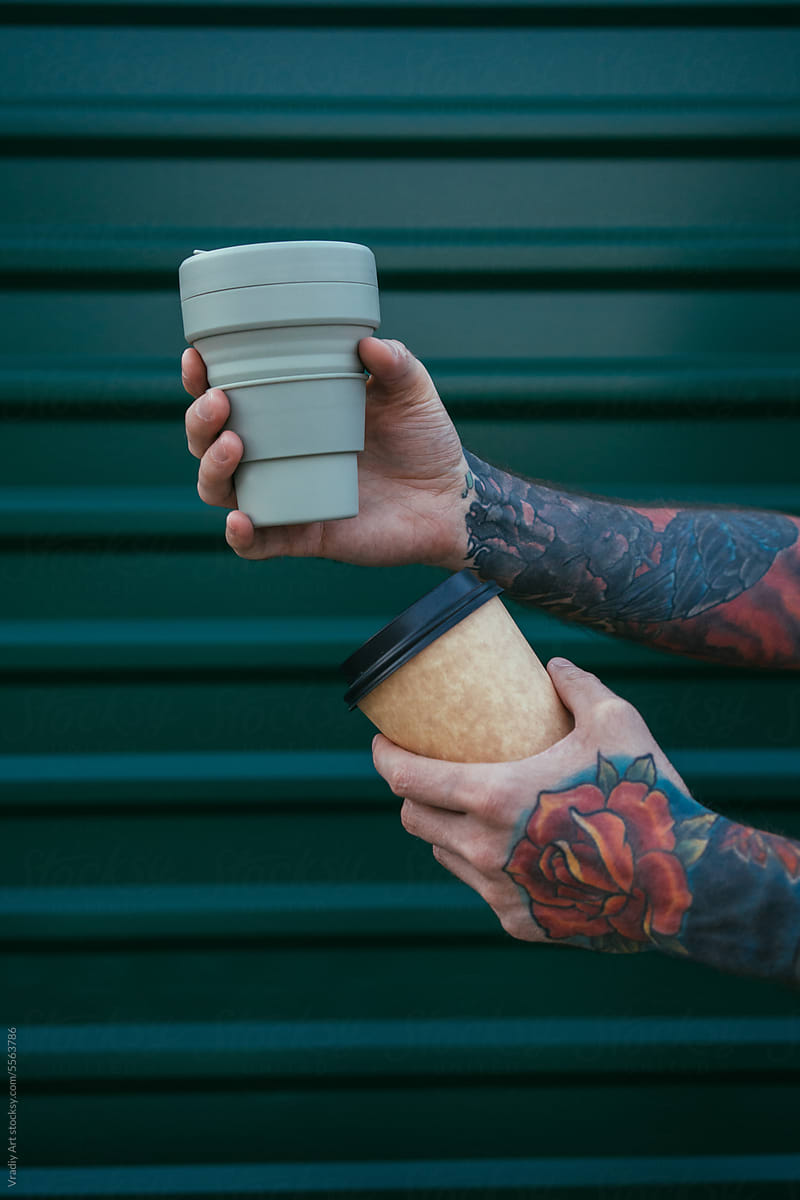 Disposable coffee cup and reusable zero waste takeaway coffee cup