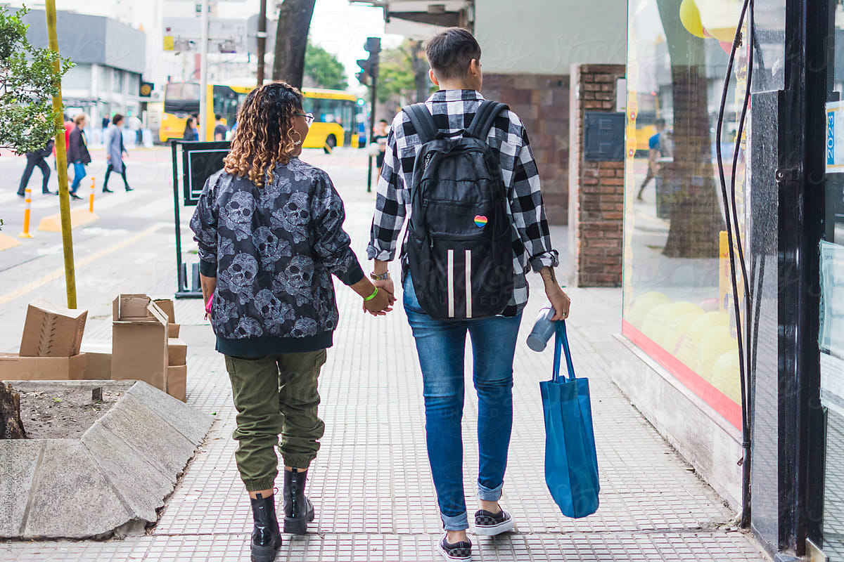 Cool couple walking going shopping