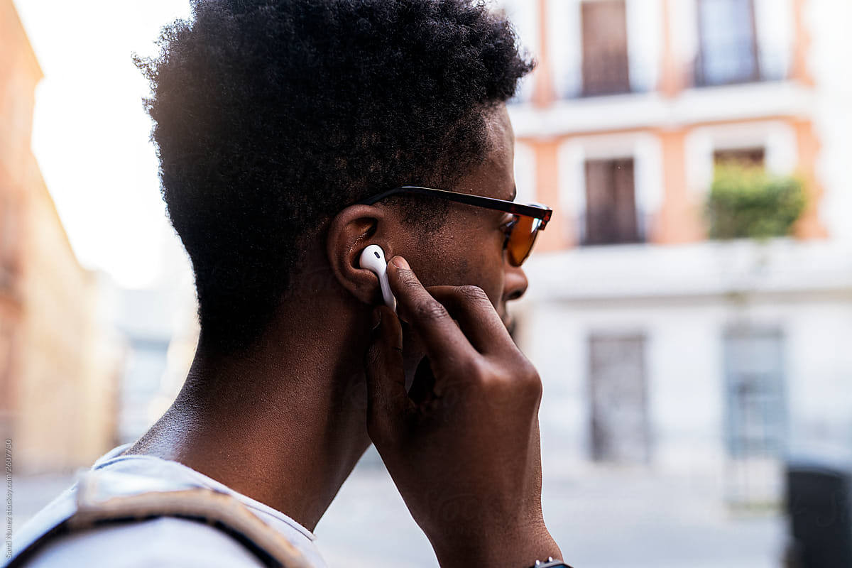 African man listening music