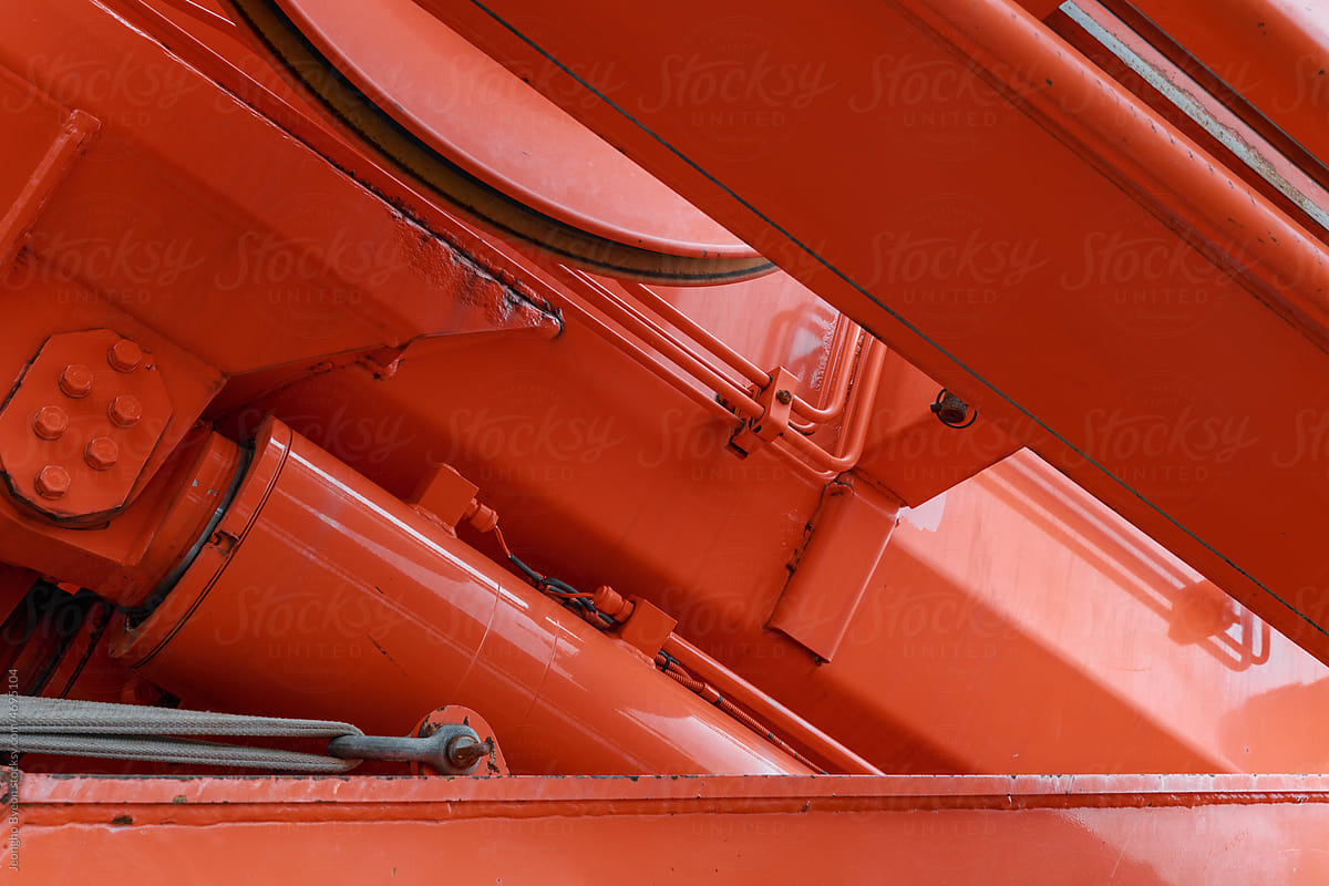 A section of an orange special vehicle.
