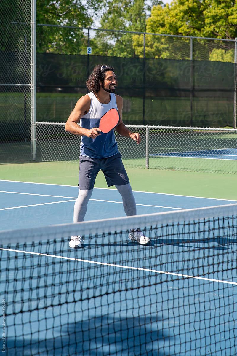 Middle Eastern Man Plays Pickleball
