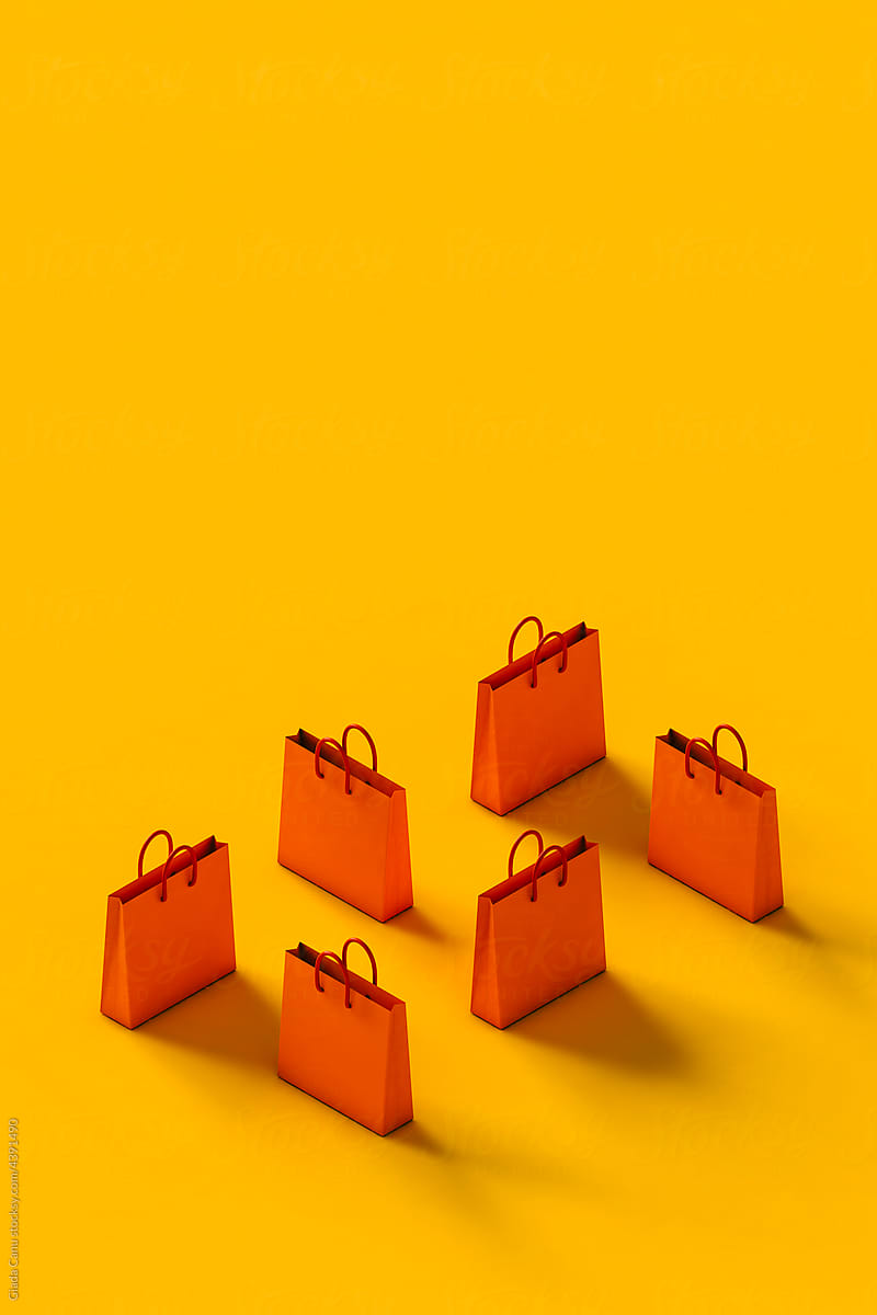 3d render of Orange shopping bag on a yellow background