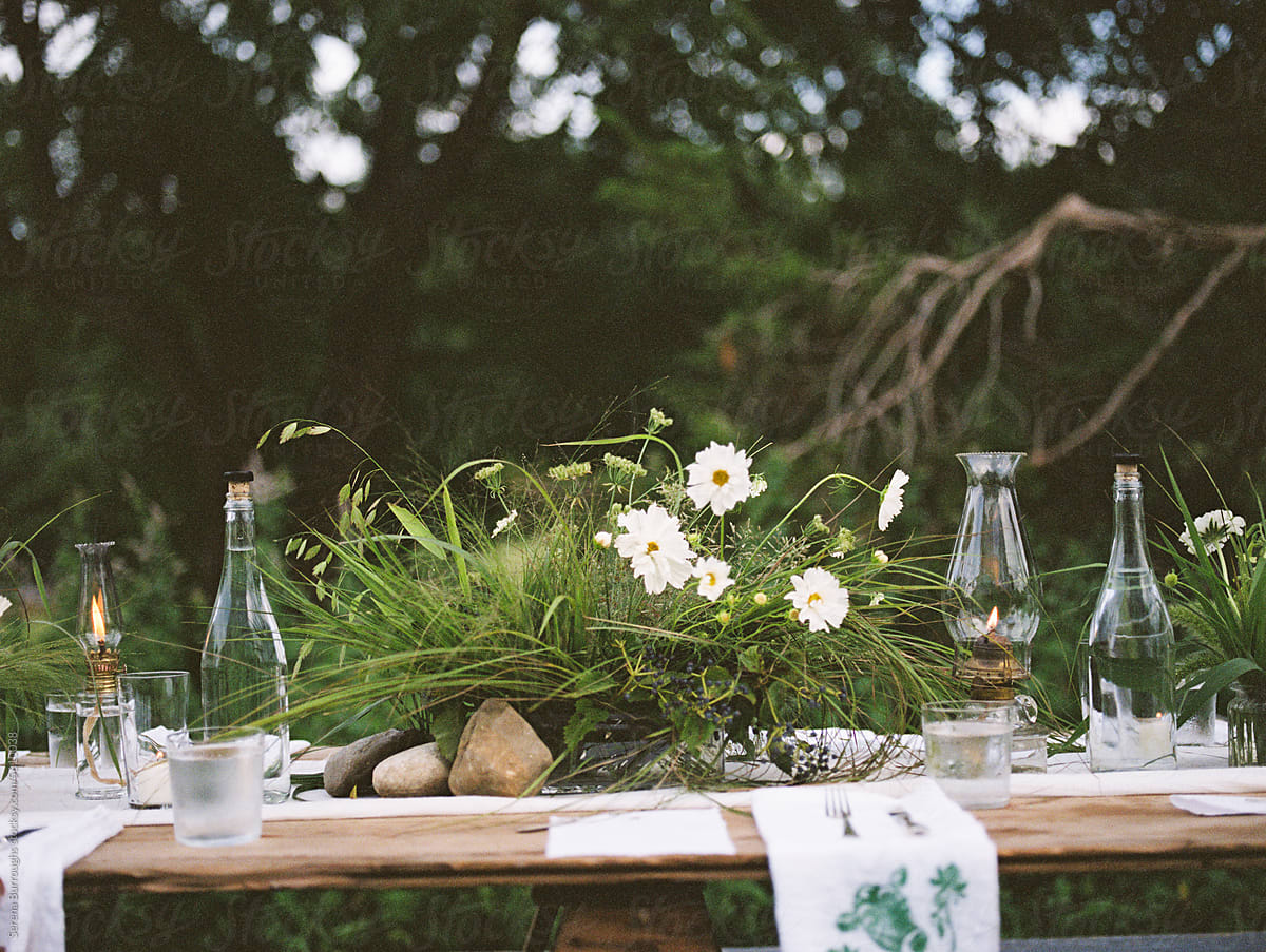dinner table set up at farm summer party