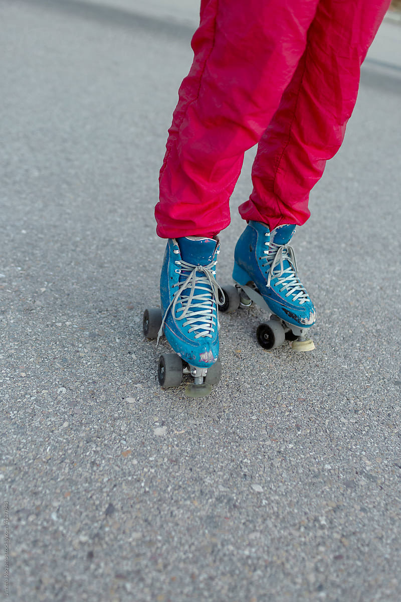 Detail of roller-skater legs with old vintage skates