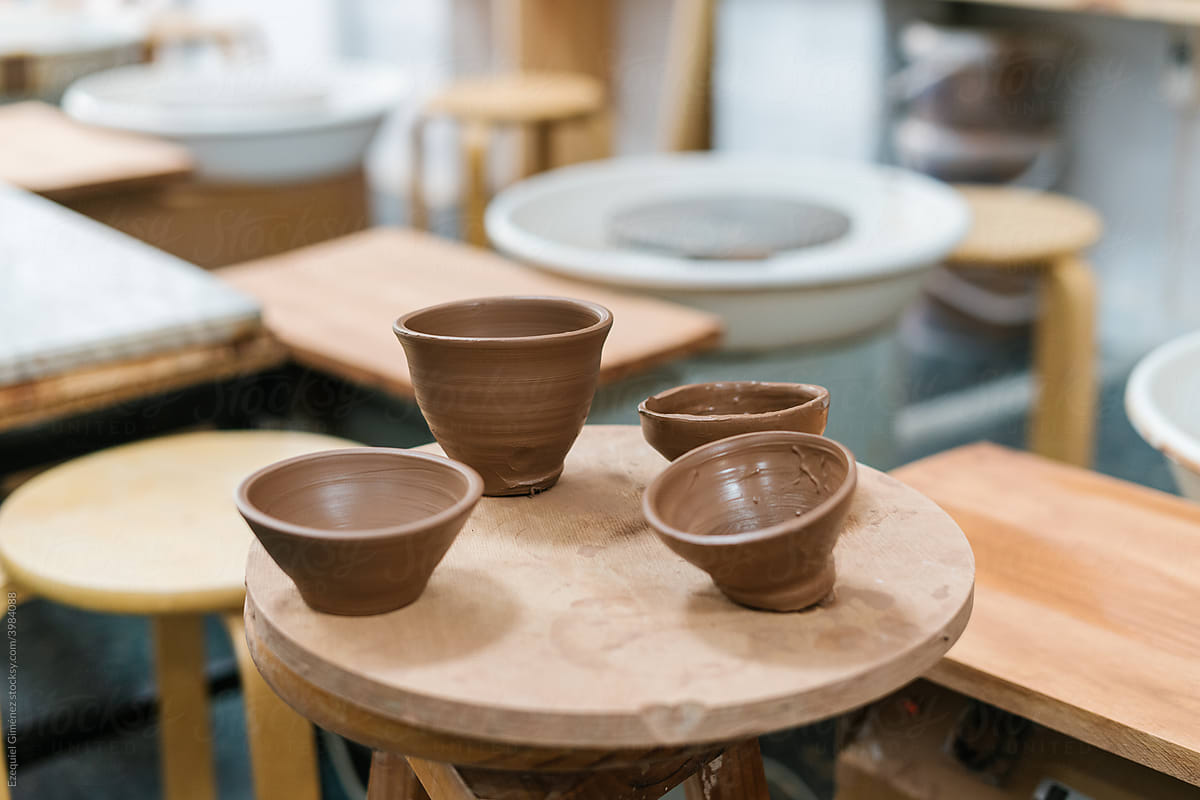 Ceramic bowls on round board