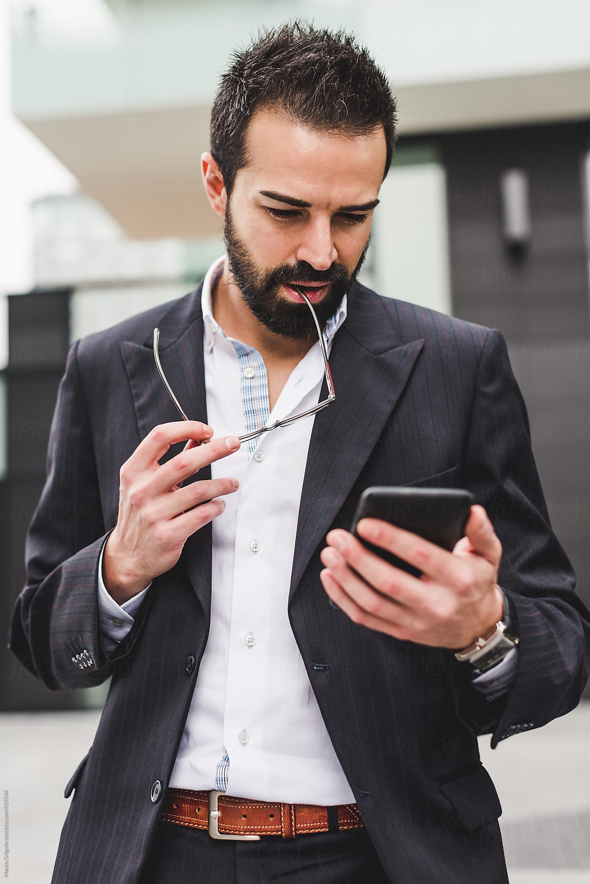 Businessman Using Mobile Phone by Mauro Grigollo - Businessman, Technology