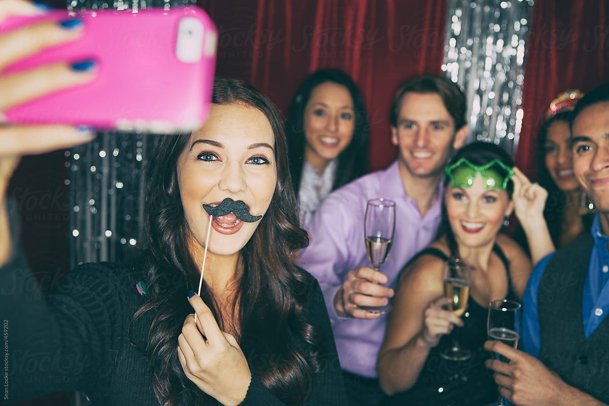 Party: Girl Holds Up Camera For Selfie