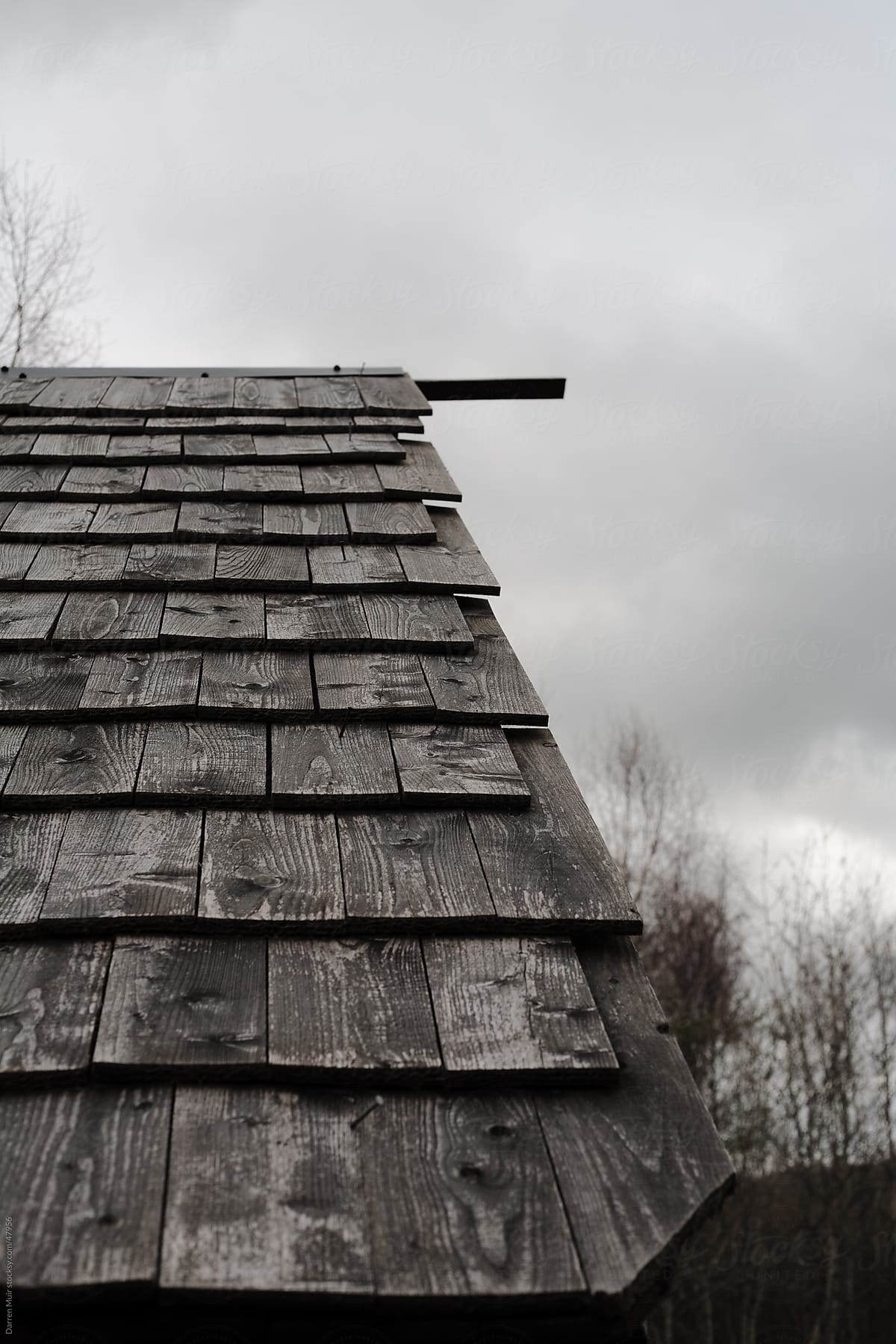 Wood Tiles on roof.