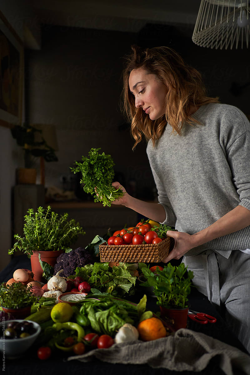 Housewife selecting ingredients for healthy vegetarian dish