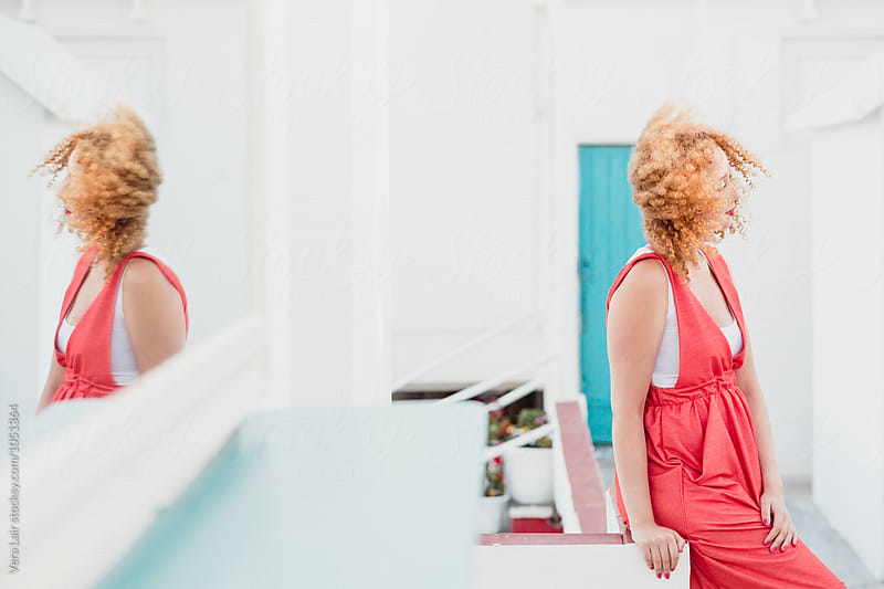 Red hair woman and her reflection