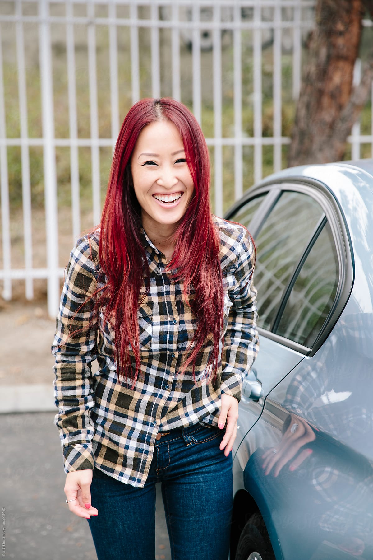 Pretty Asian Redhead Smiling And Laughing