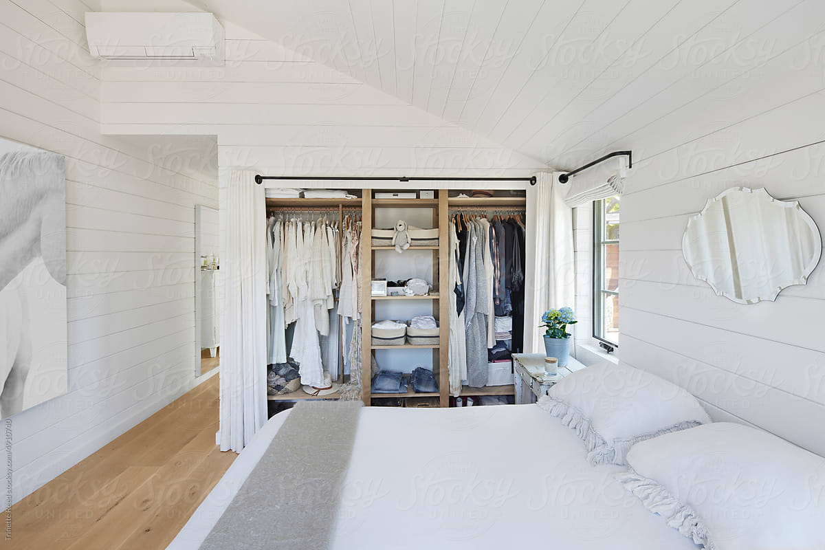 Bedroom in farmhouse with open closet