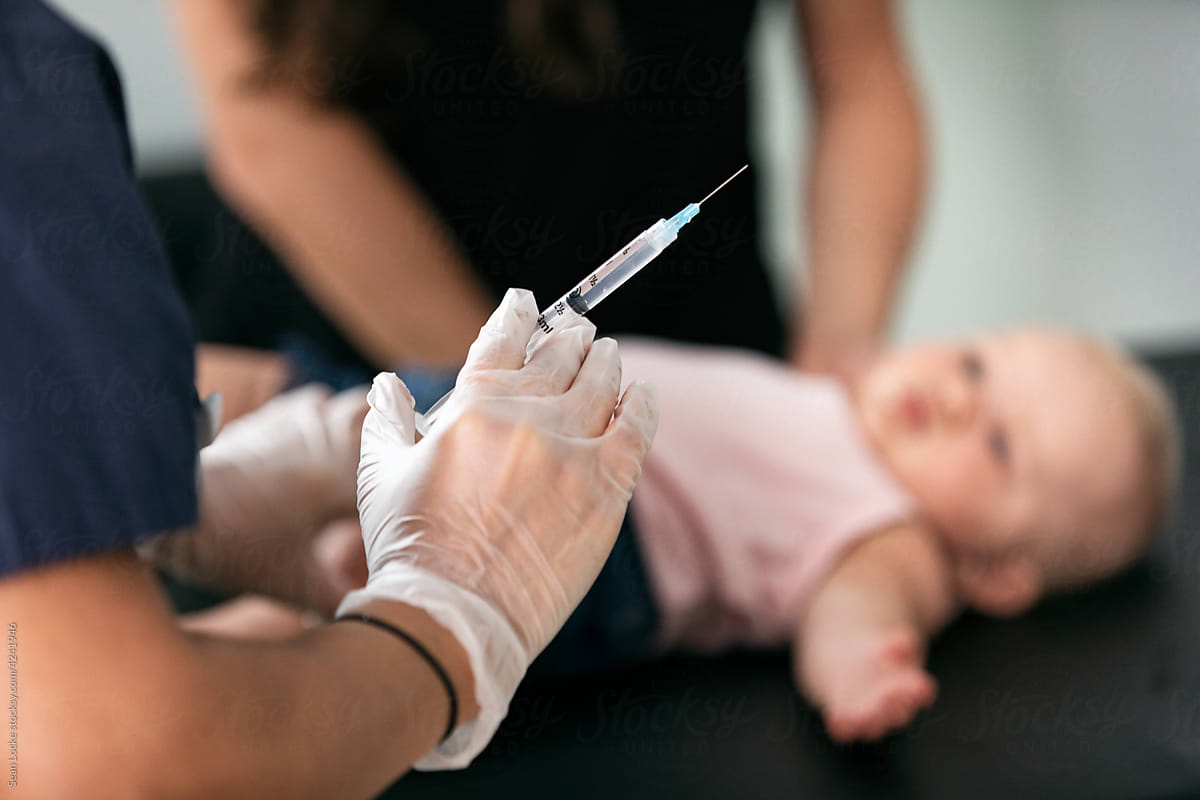 Exam: Focus On Syringe Before Immunization