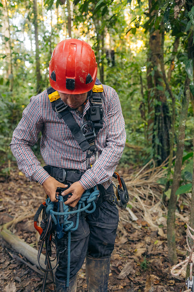 Man With Tree Climbing Equipment by Stocksy Contributor Carlos