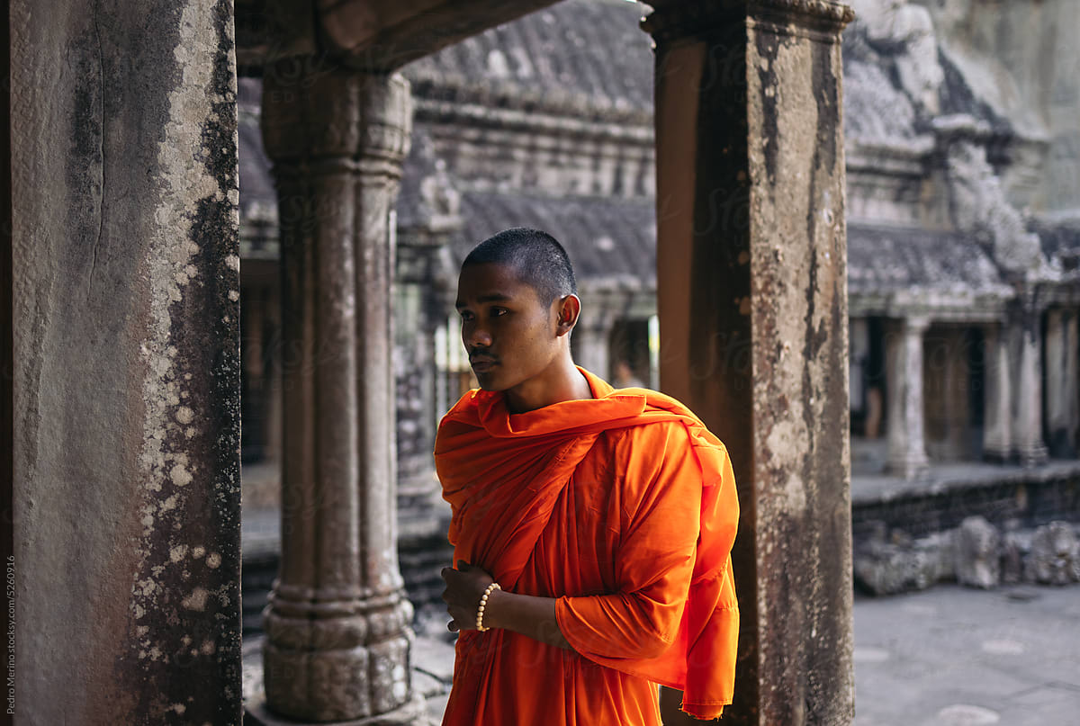 Buddhist monk visiting Angkor Wat temple