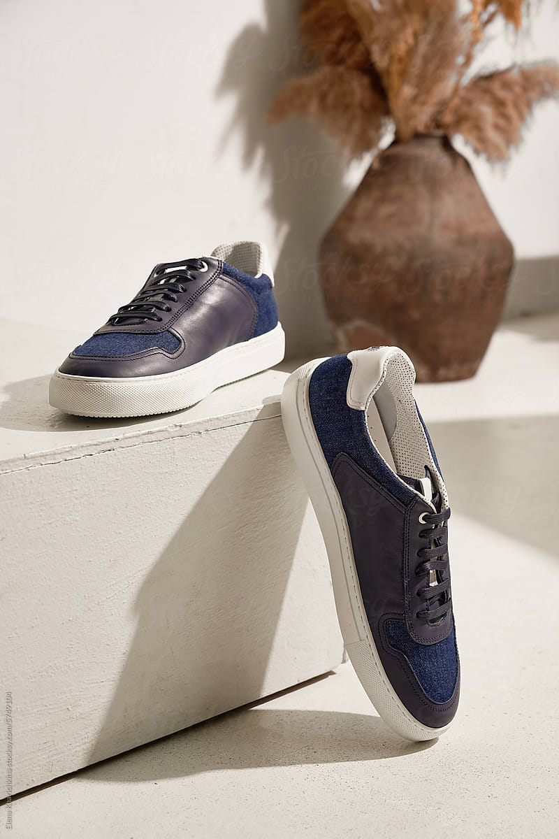 Blue leather men's sneakers in the interior