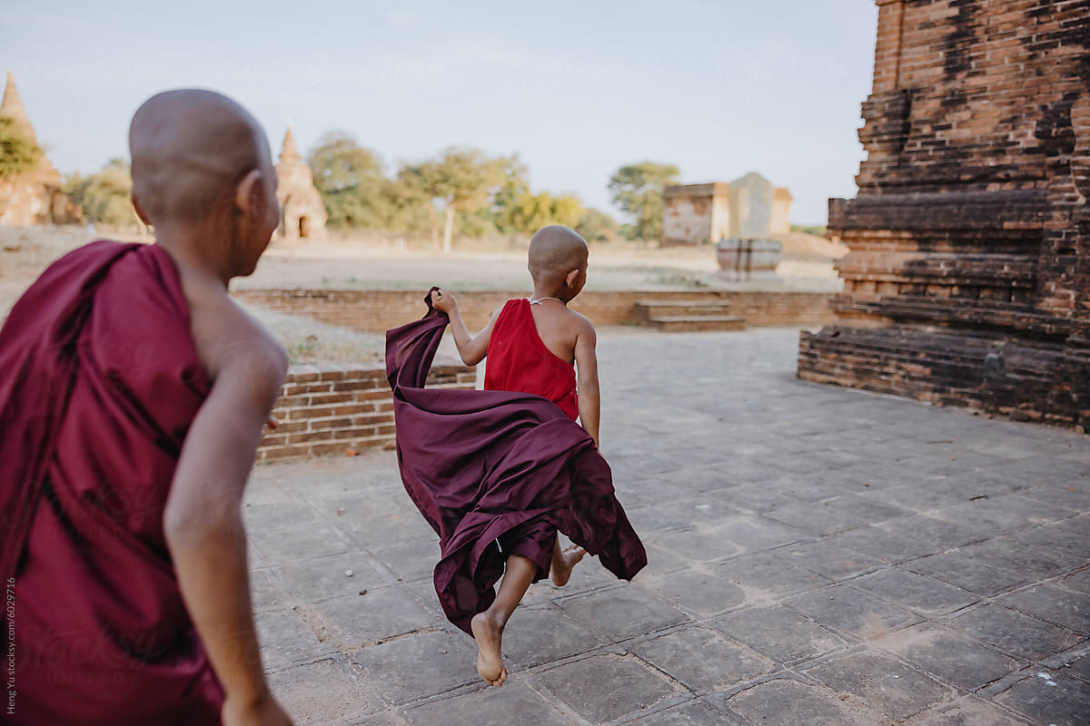 Monk running with robe flowing