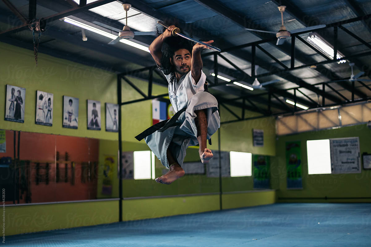 Man jumping training martial arts