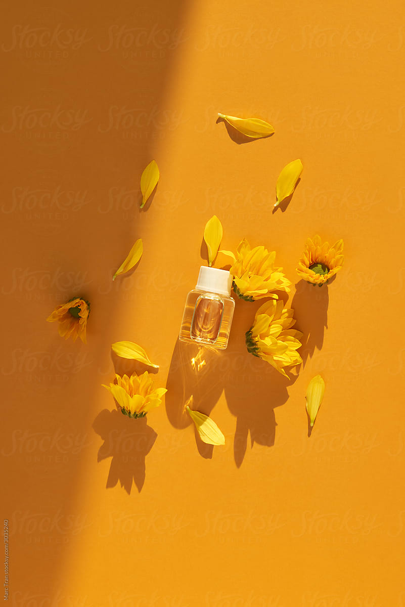 Chrysanthemum essential oil in a glass bottle