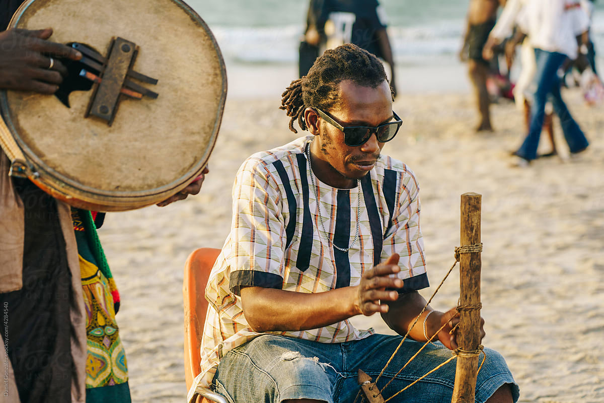 Black musicians playing traditional African music