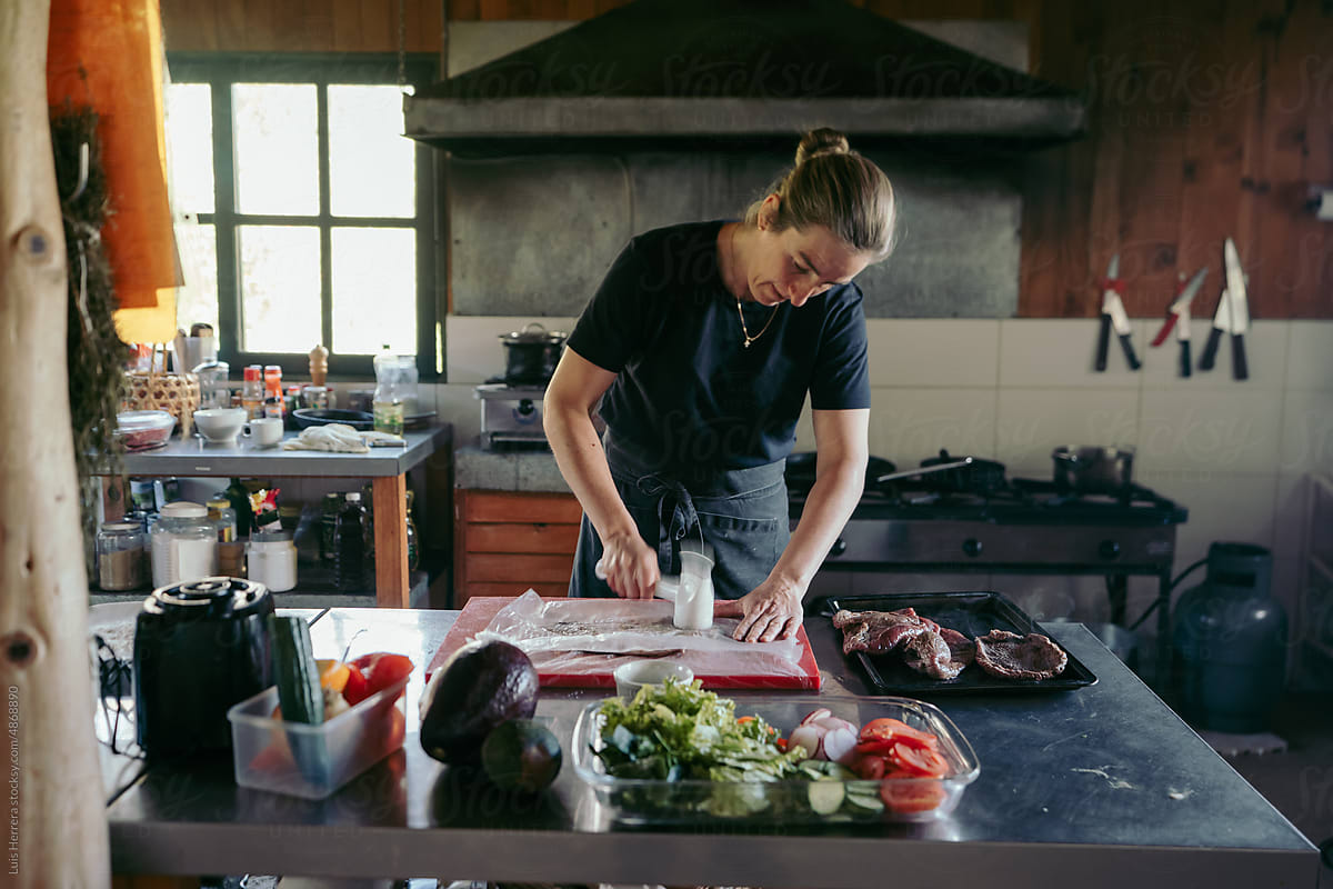 woman chef at her small business kitchen