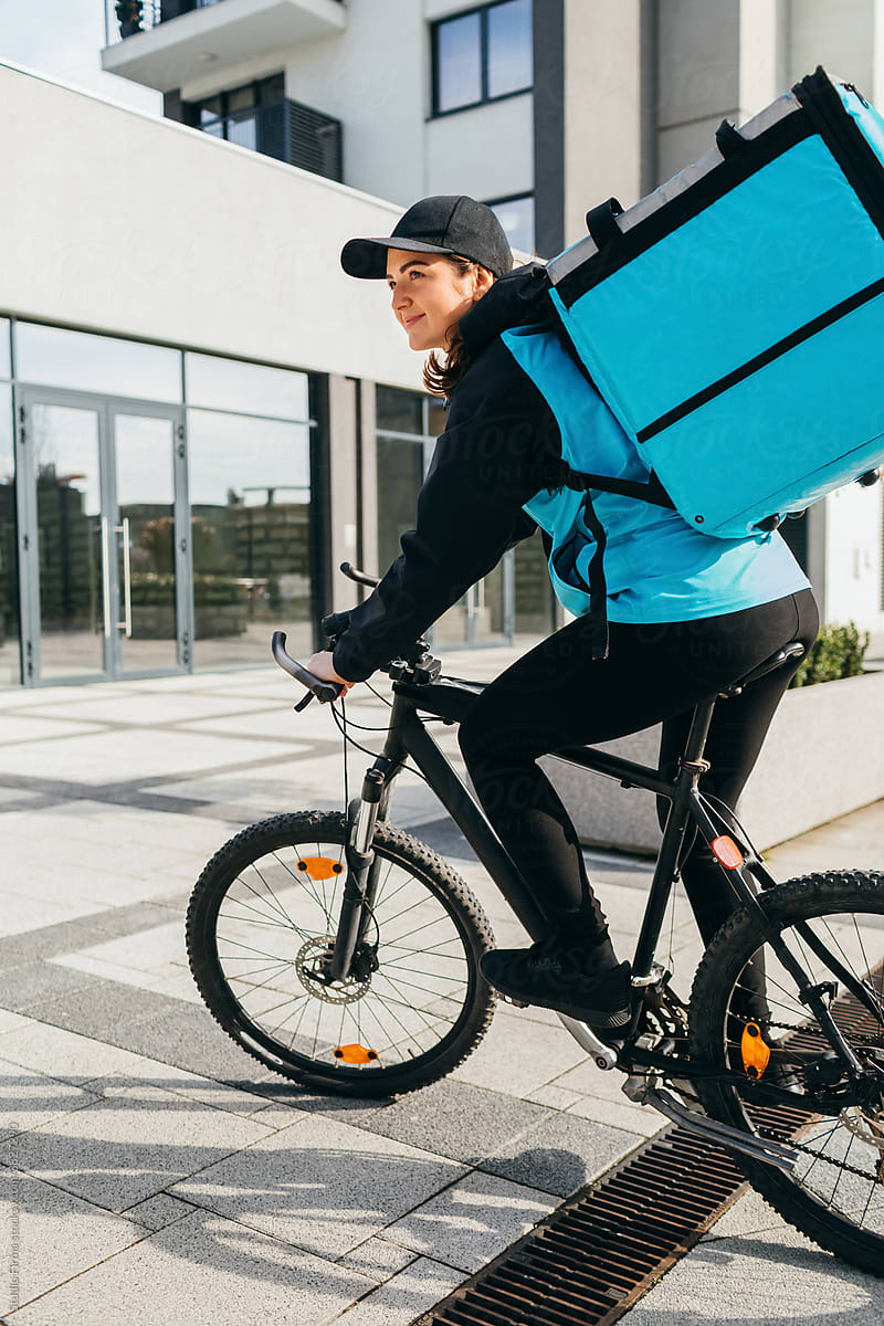 Delivery Woman Riding Bicycle