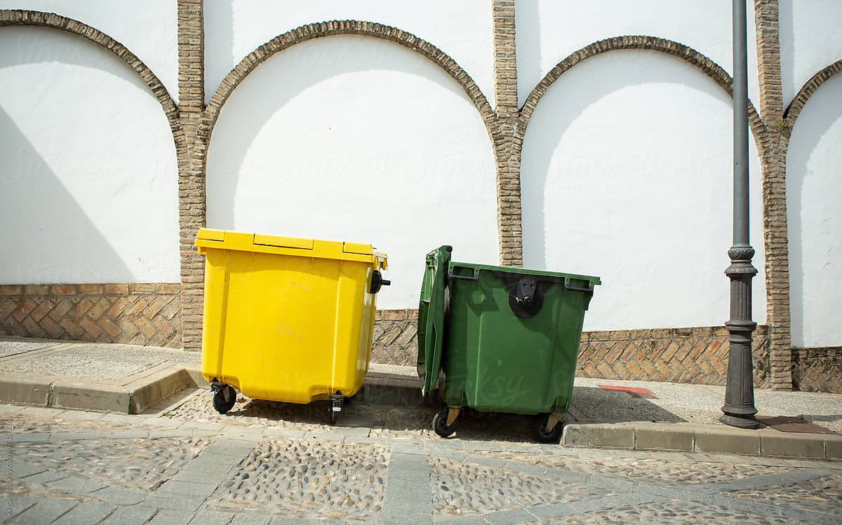 Yellow and green trash containers. Spain.