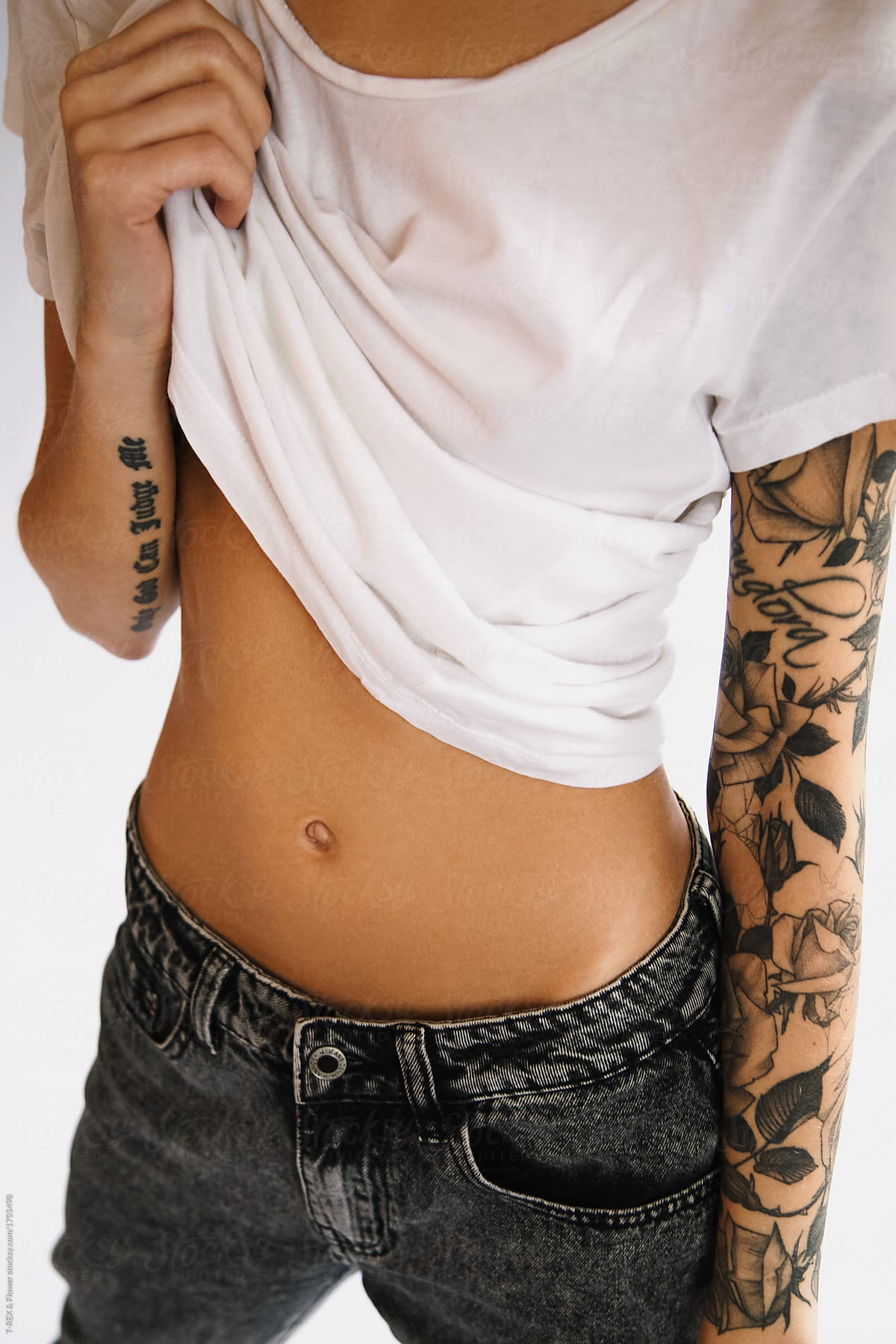 Crop slim model with tattoos body