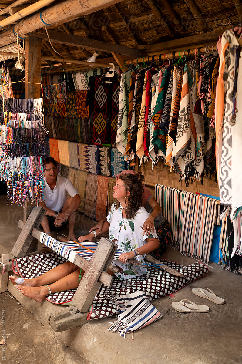 Tourist woman collaborating wth local retailers