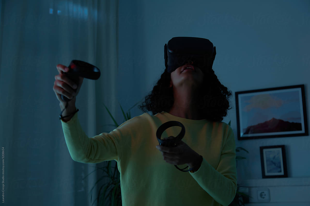 Woman playing with VR headset