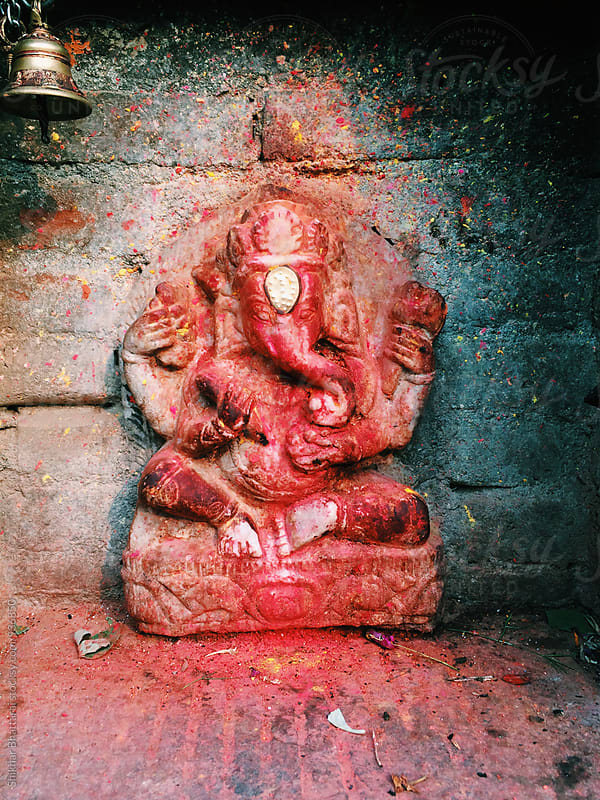 Statue of Ganesh covered in Vermilion.