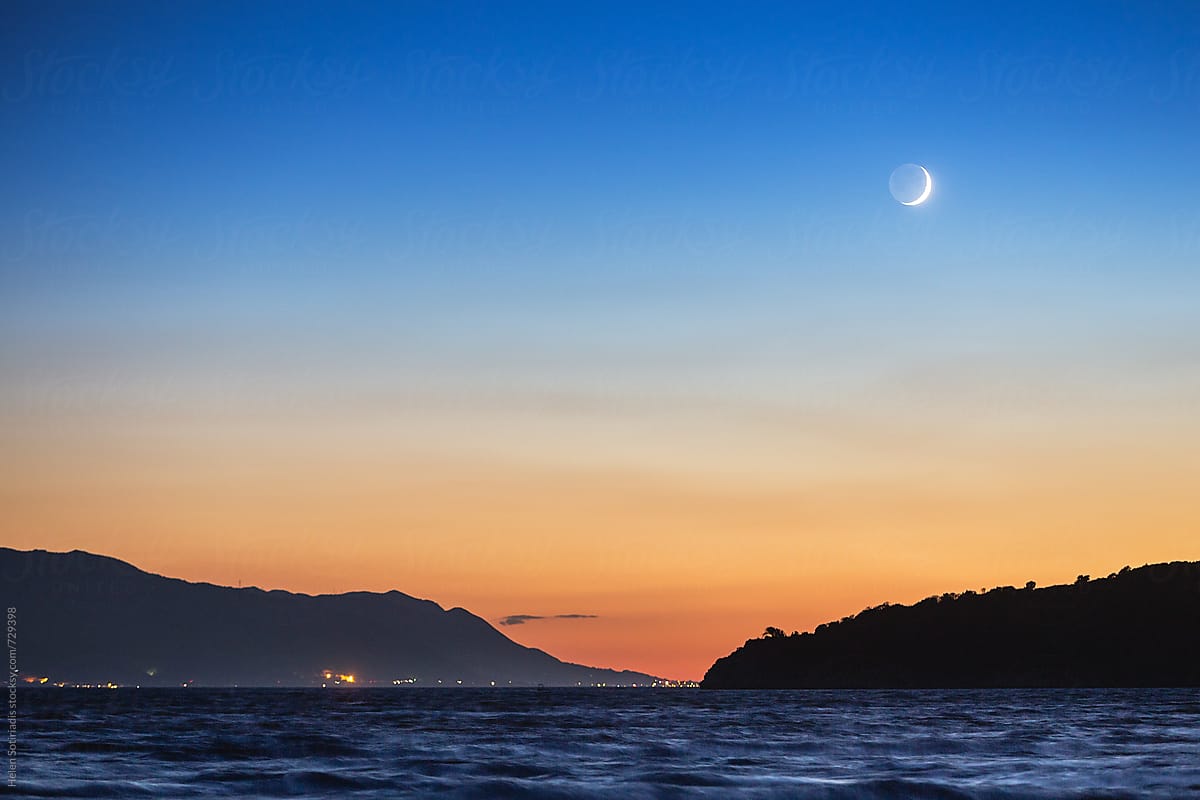 Crescent Moon over a Seascape at Twilight