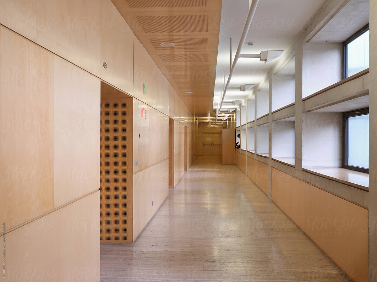 Interior corridor with isolated student