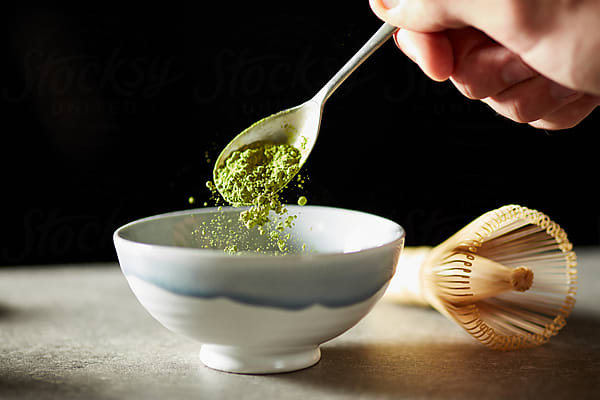 Bamboo Whisk And Bowl Of Matcha Powder. by Stocksy Contributor