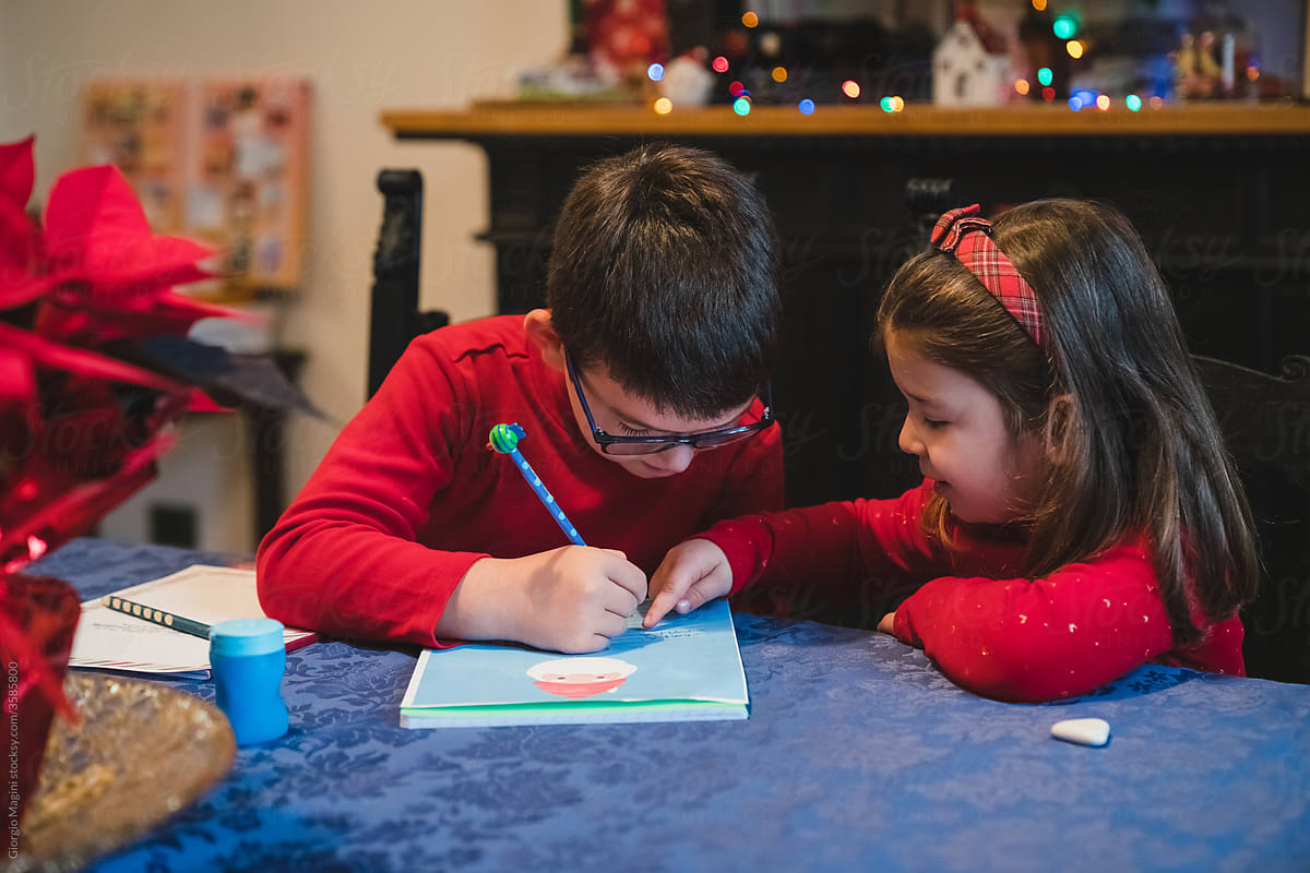 Siblings Writing to Santa Claus for Christmas