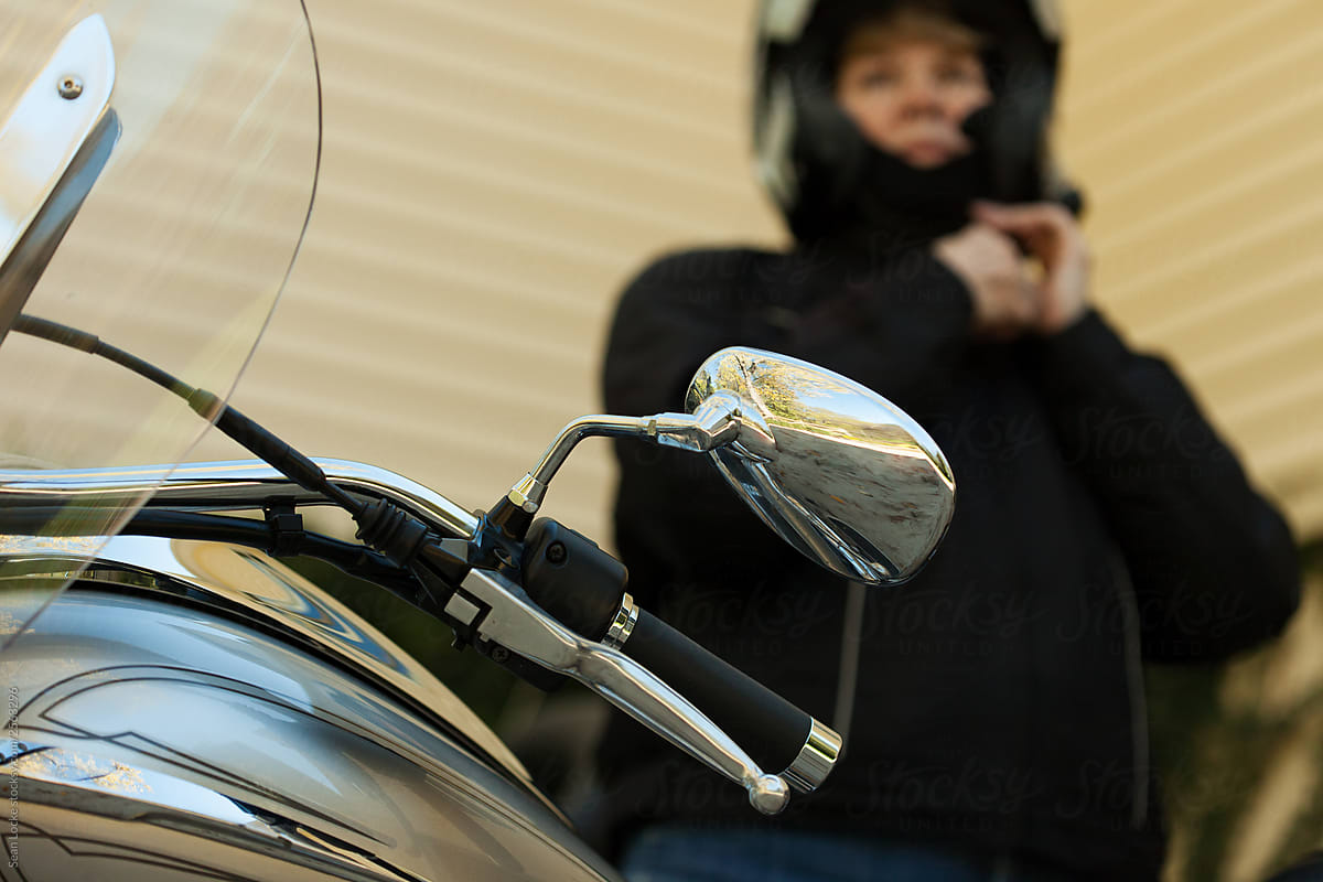 Rider: Focus On Mirror With Rider Behind