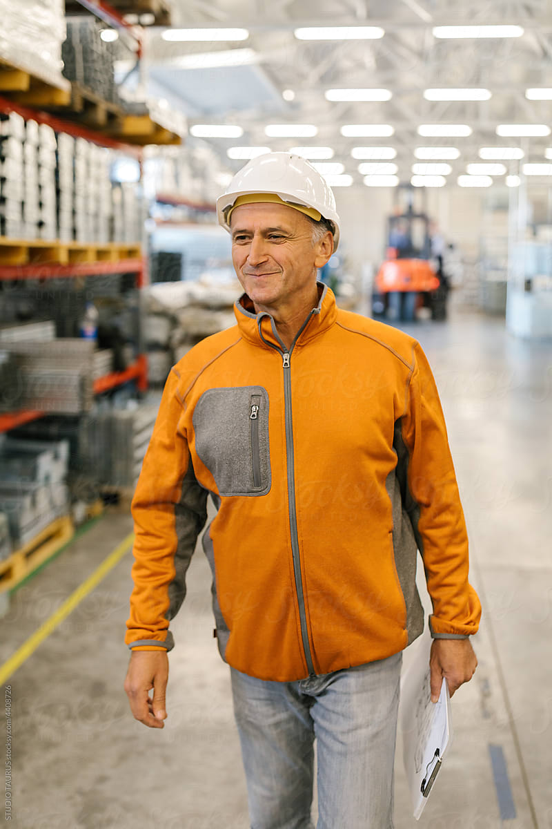 Senior Man In Inspection In A Factory